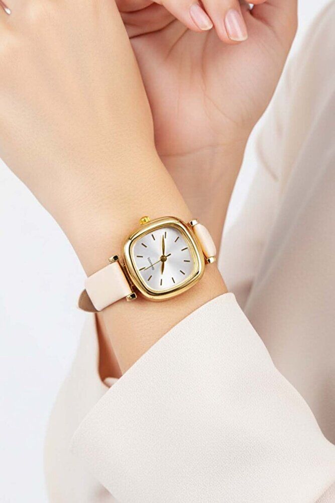 Gold Renk Oval Kasa Krem Renk Deri Kordonlu Genç Kız Kadın Minimal Şık Analog Günlük Kol Saati
