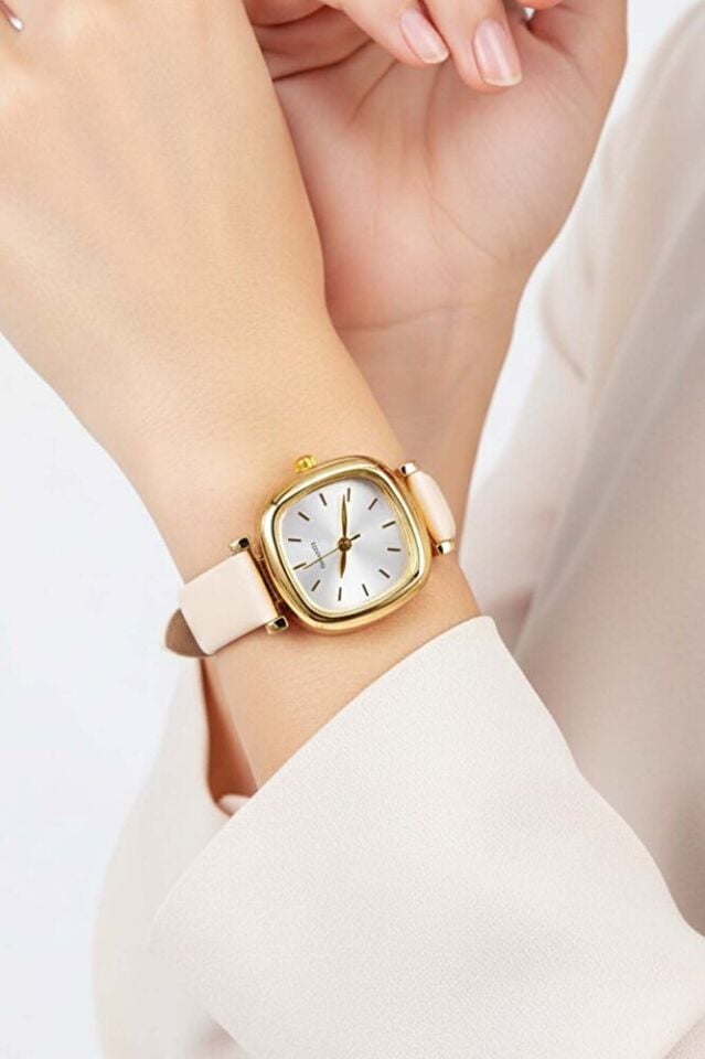 Gold Renk Oval Kasa Krem Renk Deri Kordonlu Genç Kız Kadın Minimal Şık Analog Günlük Kol Saati