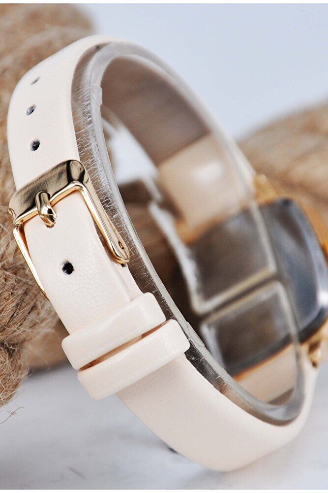 Gold Renk Oval Kasa Krem Renk Deri Kordonlu Genç Kız Kadın Minimal Şık Analog Günlük Kol Saati