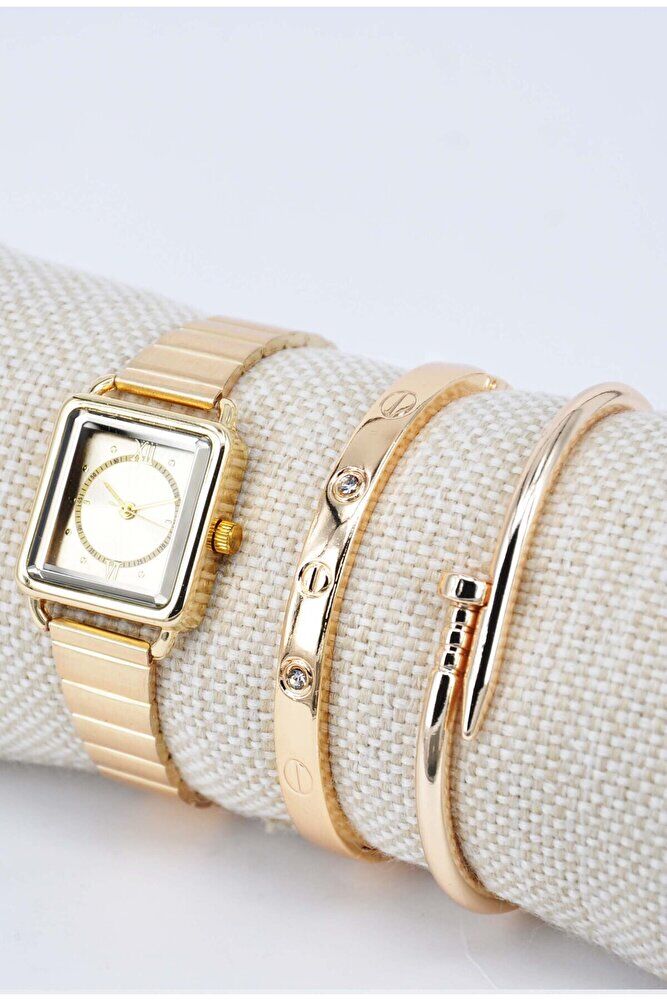 Ayarlanır Kordon Altın Renk Roma Rakam Taşlı ve Çivili Model Bileklikli Kadın Kol Saati SU-895