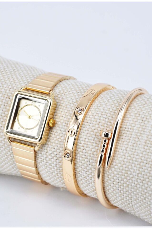 Ayarlanır Kordon Altın Renk Roma Rakam Taşlı ve Çivili Model Bileklikli Kadın Kol Saati SU-895